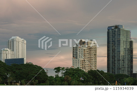 Architecture view of Modern high-rise buildings on sky background at evening time. 115934039