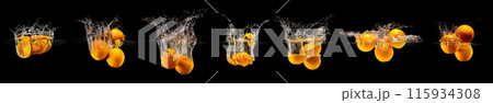 Group of fresh orange fruits falling in water with splash on black background 115934308
