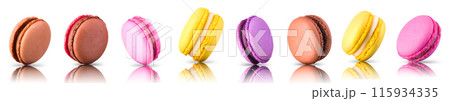 Macro photo of french caramel macaroon isolated on white background Macro photo of french caramel macaroon isolated on white background 115934335
