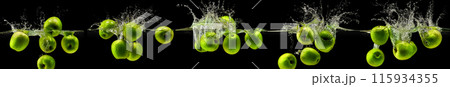 Green apple falling in water on black background Green apple falling in water on black background 115934355