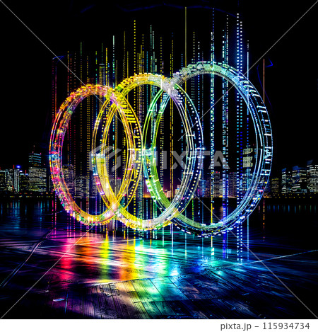 Couple of rings are lit up in the middle of dark room. 115934734