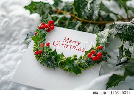 Idea for a Christmas card with a wish Merry Christmas decorated with holly and advent wreath Idea for a Christmas card with a wish Merry Christmas decorated with holly and advent wreath 115936091