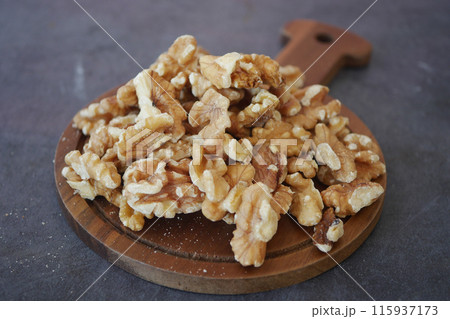 walnut on a plate on table  115937173