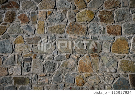 Stone wall of natural stones. Brickwall texture background 1 115937924
