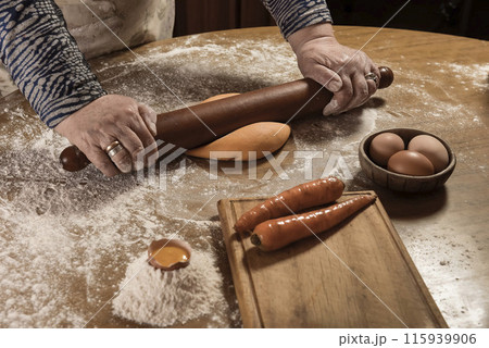 Egg dough for noodles, with ingredients on the table, traditional italian cuisine. Egg dough for noodles, with ingredients on the table, traditional italian cuisine. 115939906