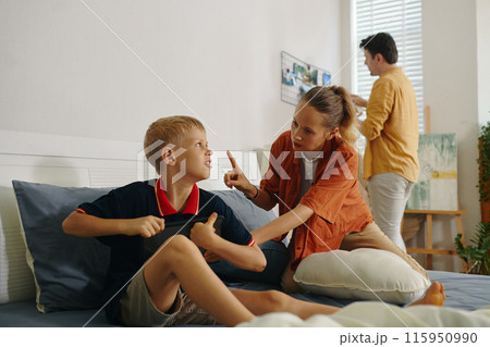 Mom Forbidding Her Son To Play On The Tablet Mom Forbidding Her Son To Play On The Tablet 115950990