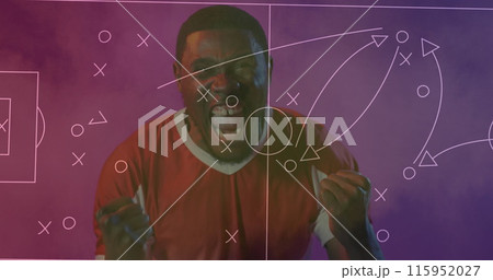 Image of football game tactical diagram over cheering african american male football fan 115952027