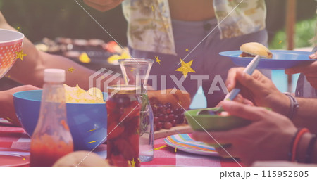 Image of stars over group of caucasian friends having bbq and talking Image of stars over group of caucasian friends having bbq and talking 115952805