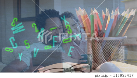 Image of colourful pencils over african american couple using tablet 115953417