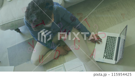 Image of letters and numbers falling over african american woman studying 115954425