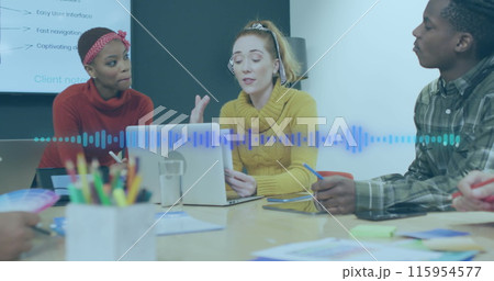 A group of diverse business people are discussing work during a meeting at their office A group of diverse business people are discussing work during a meeting at their office 115954577