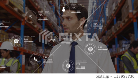 Image of data processing against caucasian male supervisor using digital tablet at warehouse 115955730