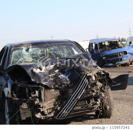 Two Cars Damaged In A Road Collision  115957241