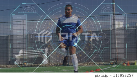 A biracial athlete wearing blue and white kit is training on a soccer field A biracial athlete wearing blue and white kit is training on a soccer field 115958257