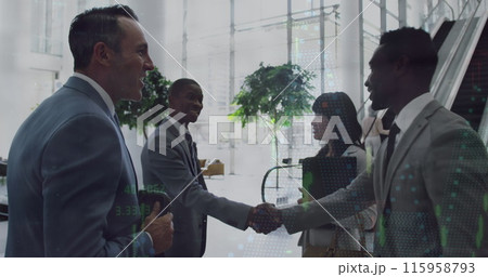 Diverse group of professionals greeting each other in office 115958793