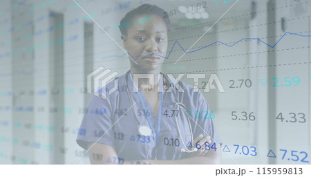 Image of financial data processing over african american female doctor in hospital Image of financial data processing over african american female doctor in hospital 115959813