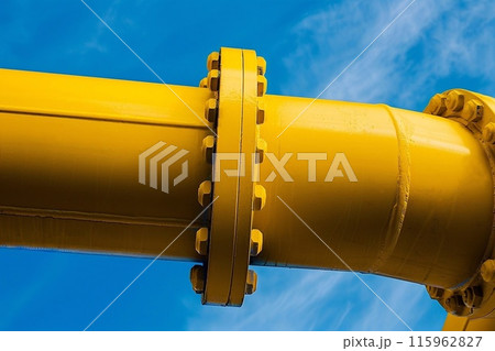 Industrial yellow pipe with sky background 115962827