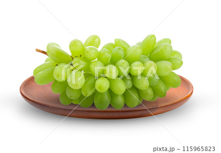 Green grape in wood plate isolated on white background 115965823
