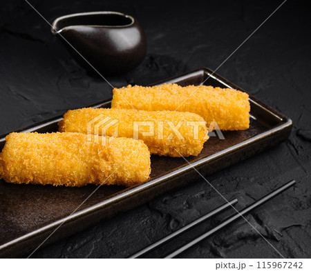 Crispy fried fish rolls with sweet chili sauce 115967242