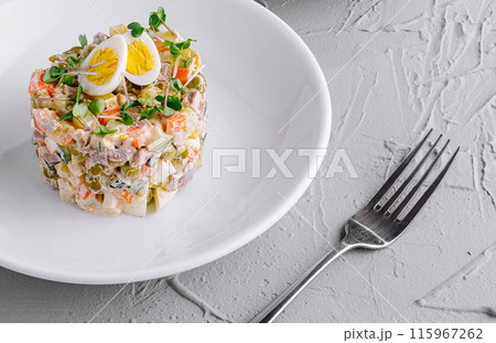 Festive holiday olivier salad on christmas table 115967262