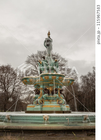 View of Ross Fountain in Princes Street Garden covered in ice in the centre of Edinburgh. 115967583