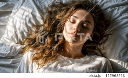 Young Woman Sleeping Peacefully in Bed Young Woman Sleeping Peacefully in Bed 115968668