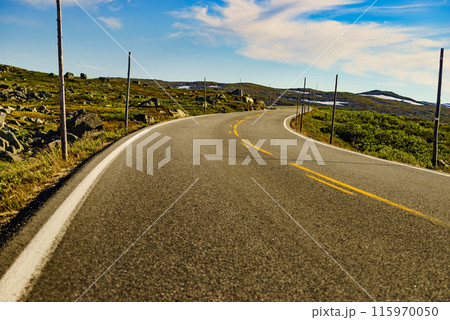 Road crossing Hardangervidda plateau, Norway Road crossing Hardangervidda plateau, Norway 115970050