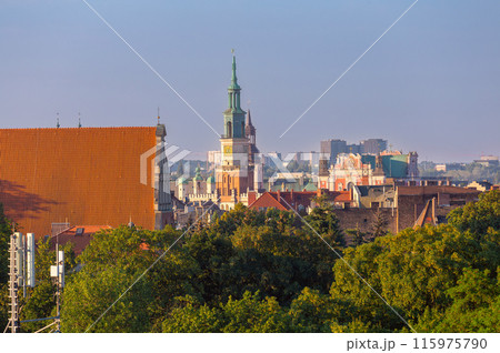 City Hall clock tower on the market square in Poznan 115975790