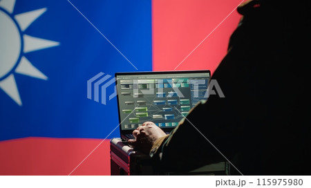 Military engineer creating fake accounts on social media to persuade other nations to act in Taiwanese government interests. Taiwan insurgent influences people online to support independence, camera A 115975980