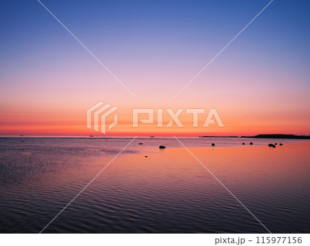早春の宗谷岬 朝焼けに染まる朝凪の海 早春の宗谷岬 朝焼けに染まる朝凪の海 115977156