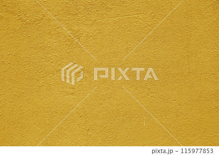 The wall surface is covered with orange plaster. The wall surface is covered with orange plaster. 115977853