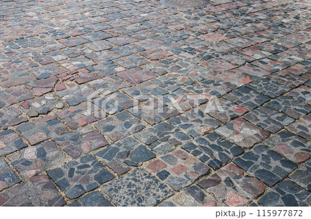 Abstract background of old cobblestone pavement close-up. 115977872