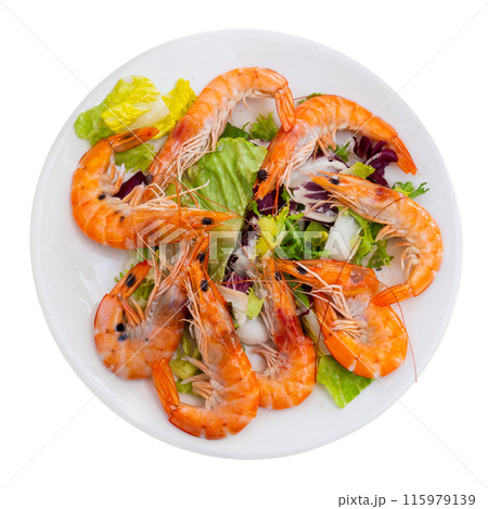 Seafood dish. Tasty grilled shrimp served with vegetables and lemon Seafood dish. Tasty grilled shrimp served with vegetables and lemon 115979139