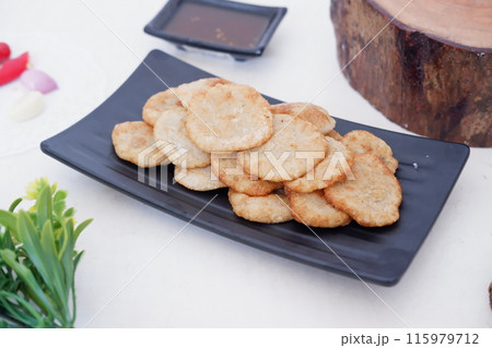 french fries in round slices as a background french fries in round slices as a background 115979712