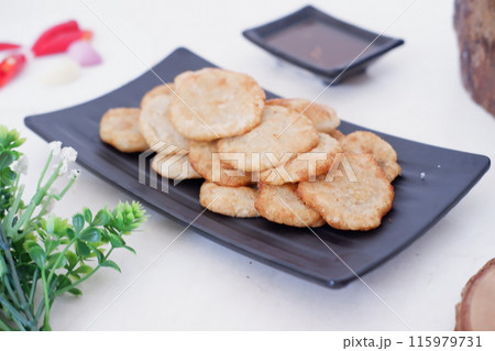 french fries in round slices as a background french fries in round slices as a background 115979731
