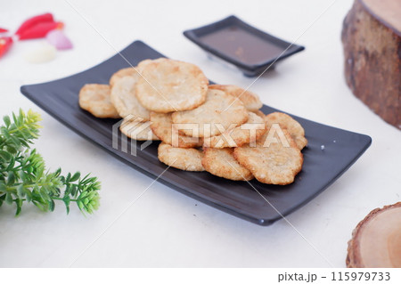french fries in round slices as a background french fries in round slices as a background 115979733