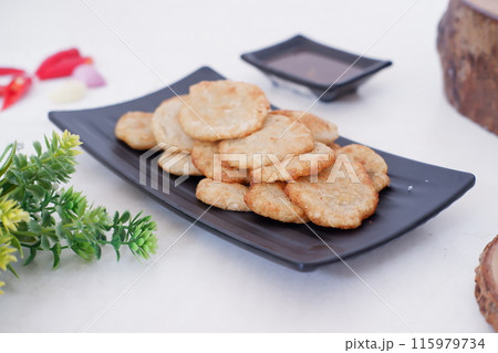 french fries in round slices as a background french fries in round slices as a background 115979734