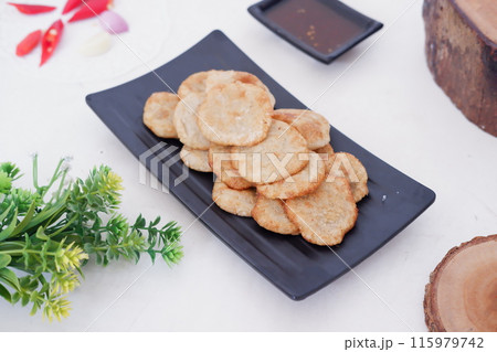 french fries in round slices as a background french fries in round slices as a background 115979742
