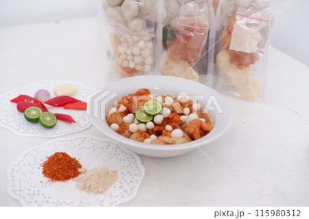 Meatballs with Peanut Crackers as a Background Meatballs with Peanut Crackers as a Background 115980312