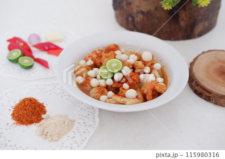 Meatballs with Peanut Crackers as a Background Meatballs with Peanut Crackers as a Background 115980316