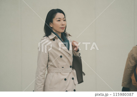 a forty-something woman a forty-something woman 115980387