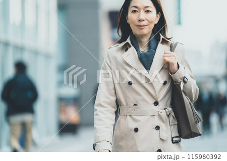 a forty-something woman a forty-something woman 115980392