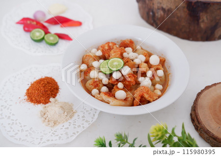 Meatballs with Peanut Crackers as a Background Meatballs with Peanut Crackers as a Background 115980395