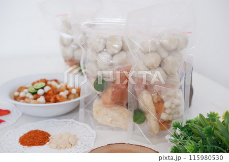 Meatballs with Peanut Crackers as a Background Meatballs with Peanut Crackers as a Background 115980530