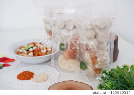 Meatballs with Peanut Crackers as a Background Meatballs with Peanut Crackers as a Background 115980534