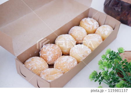 delicious snowball donuts as a background delicious snowball donuts as a background 115981137