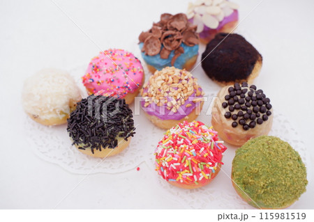 ball donuts with various flavors as a background ball donuts with various flavors as a background 115981519