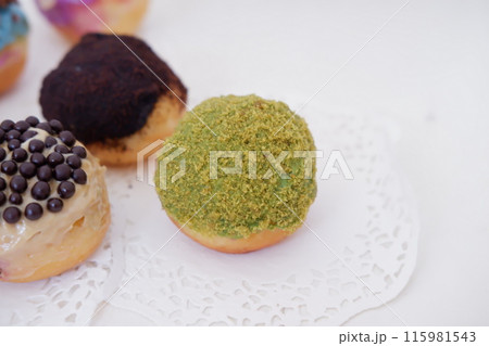 ball donuts with various flavors as a background 115981543