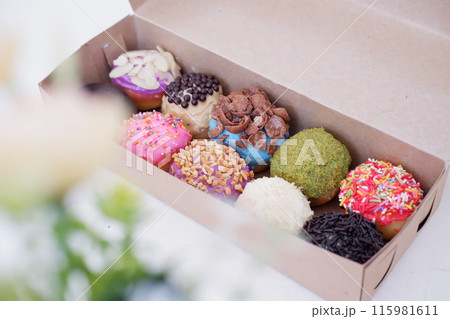 ball donuts with various flavors as a background 115981611