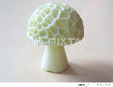 Object in the form of mushroom of white color printed on a 3D printer. Three-dimensional model printed on a 3D printer from molten plastic of red color. Concept 3D Printing. FDM 3D Printing technology Object in the form of mushroom of white color printed on a 3D printer. Three-dimensional model printed on a 3D printer from molten plastic of red color. Concept 3D Printing. FDM 3D Printing technology 115982601